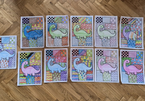 Dinozaury pokolorowane przez dzieci.