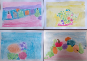 Prace dzieci - obrazki przedstawiające owoce namalowane przez dzieci.